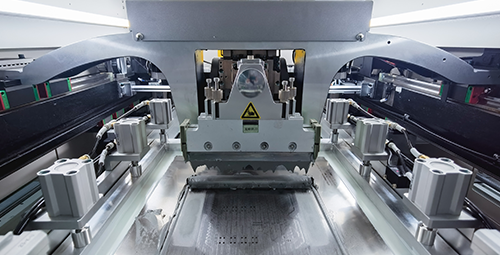 Solder paste application using a stencil in SMT assembly