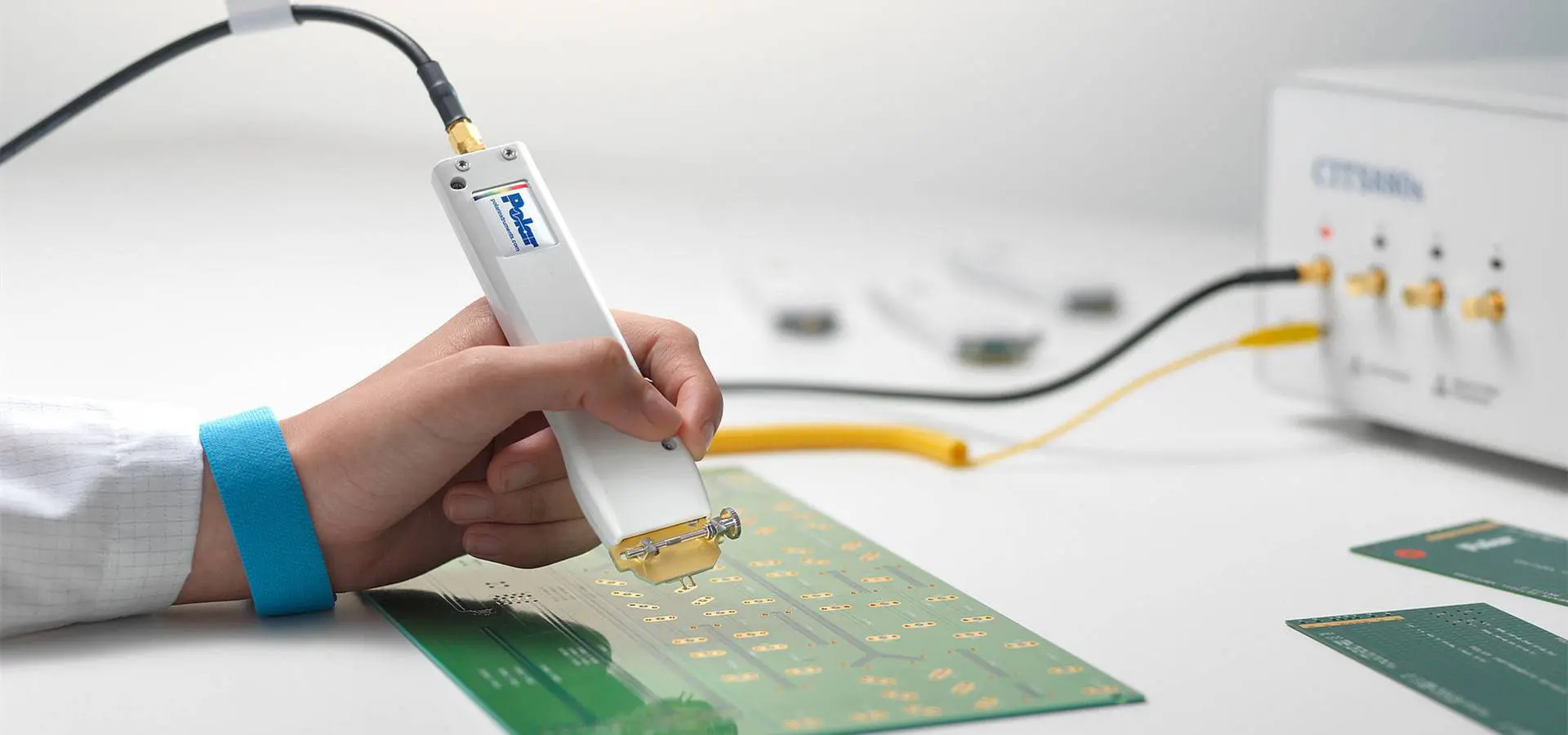 Close-up of ICT test probes during electronics testing for EV PCBs