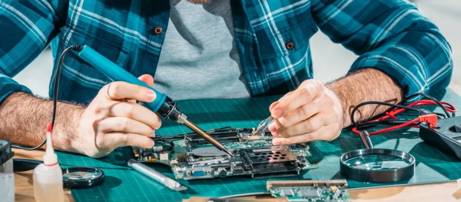 Hand soldering SMD components on a DIY PCB