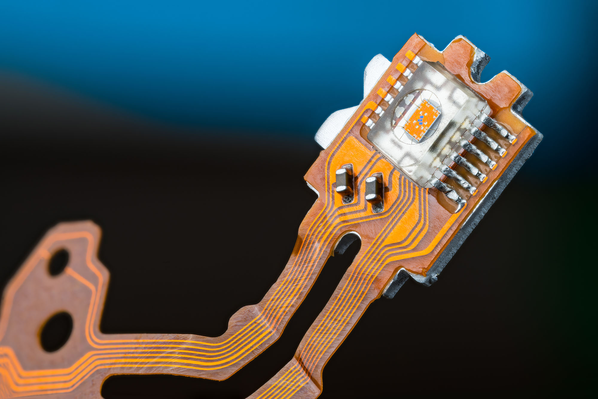Flex PCB connector on a flexible circuit for reliable electrical connections.