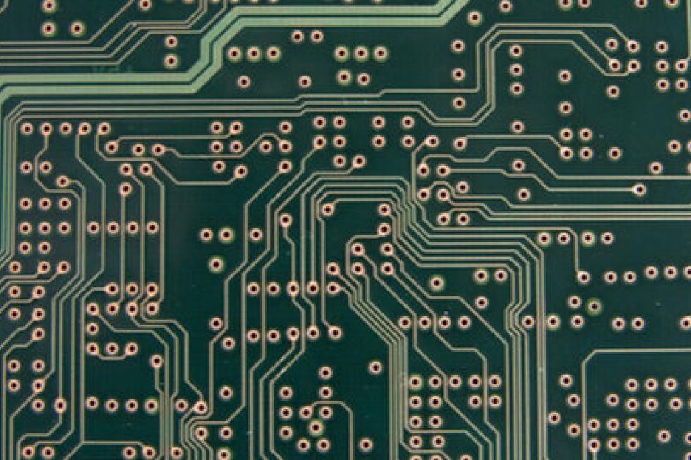 Cross-section of HDI PCB showing microvias for router and switch designs