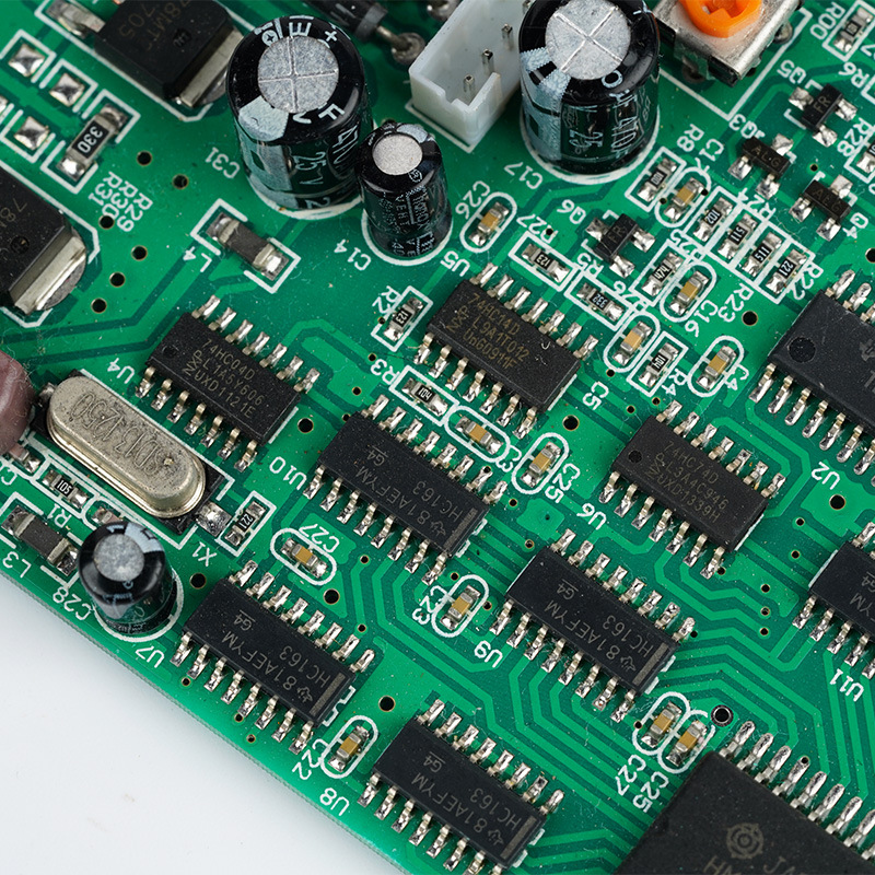 Mixed technology PCB with through-hole and surface-mount components.