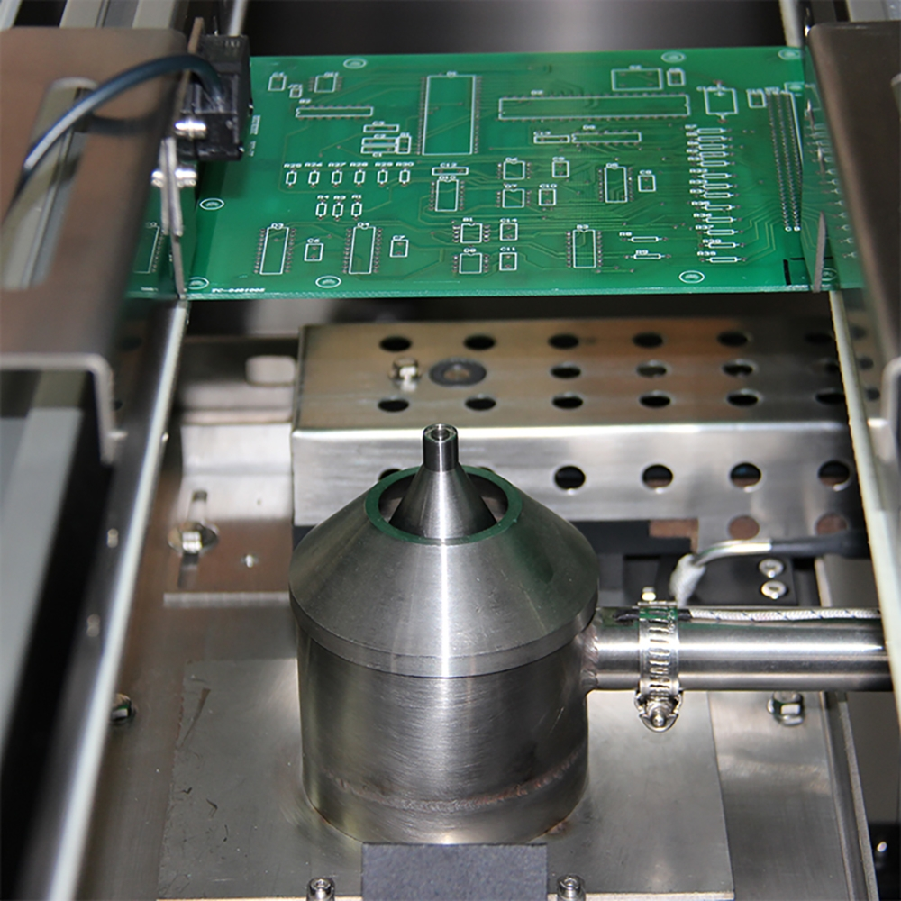 Conveyor system in wave soldering machine optimizing speed for PCB assembly.