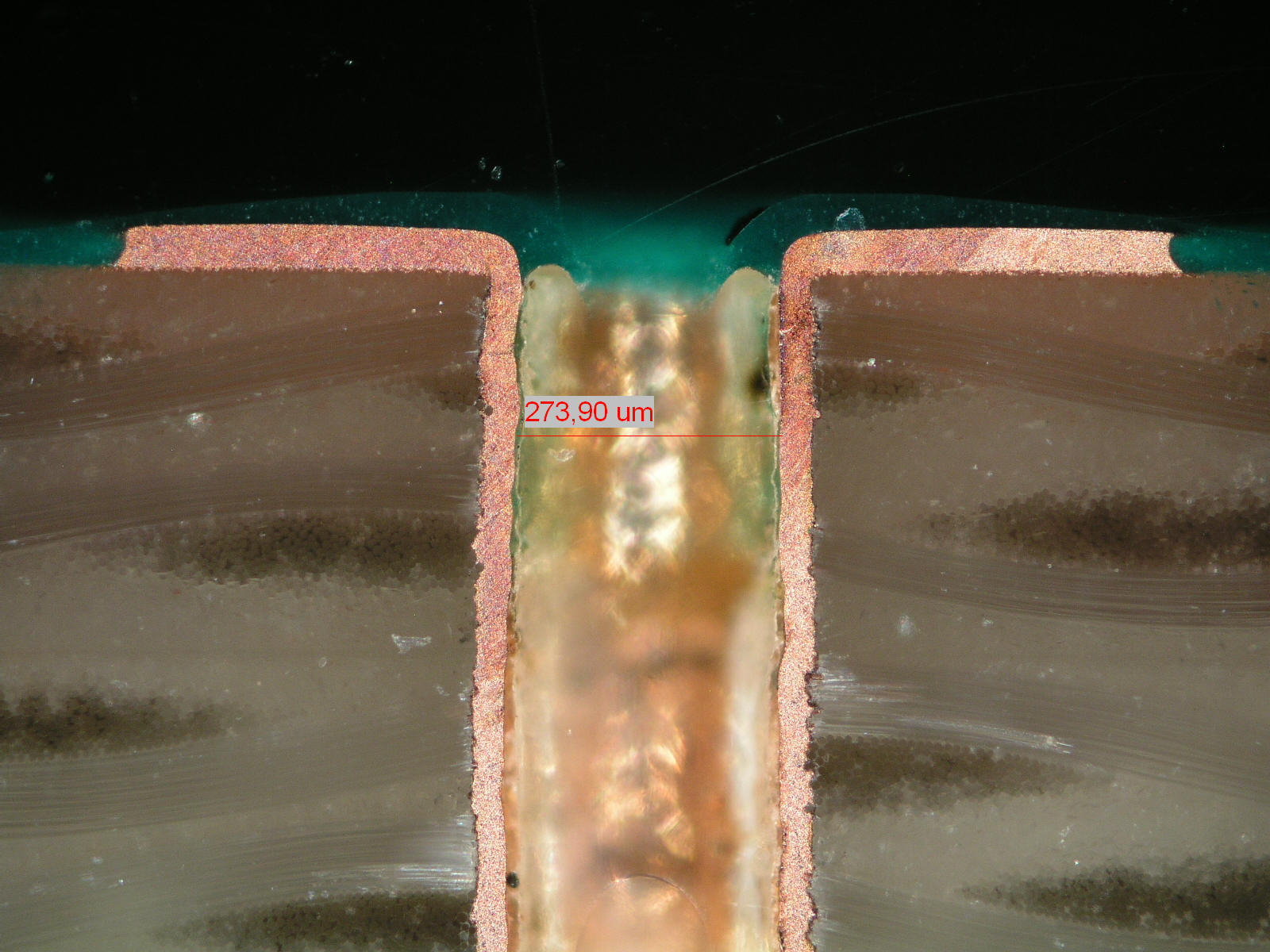 Cross-section of gold-plated hole showing quality problems in connector PCB