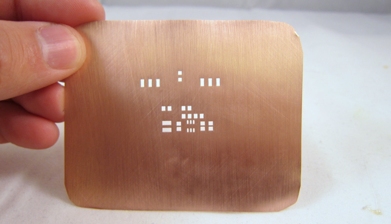 Picture Placement: Insert an image here showing a close-up of a custom stencil being used to apply solder paste on a PCB. ALT Text: "DIY stencil printing for PCB with solder paste application
