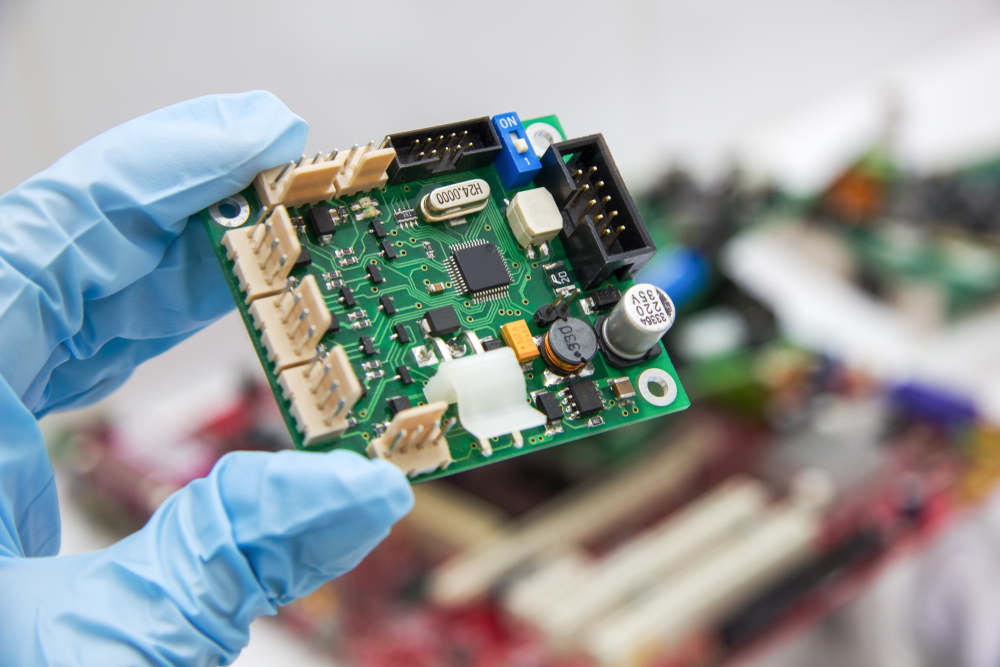 Encapsulated component board with Parylene coating for implantable medical PCB reliability