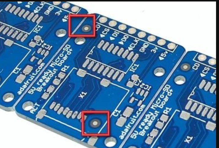 PCB with panel fiducials positioned at corners for automated stencil machine alignment