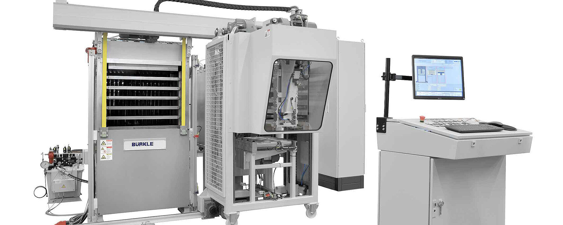 Lamination press with hot plates during PCB manufacturing.