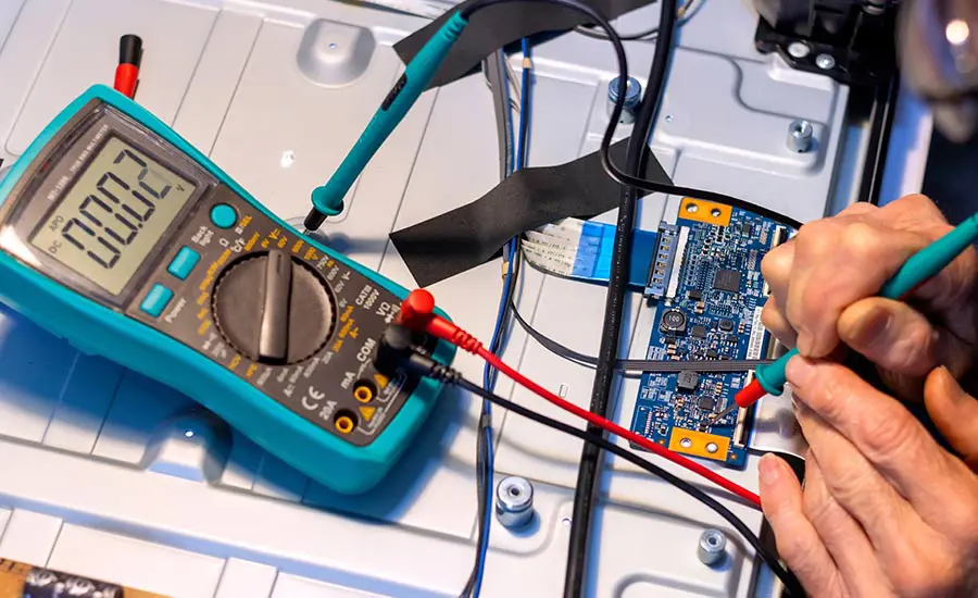 Testing voltage on a water treatment PCB for power supply troubleshooting