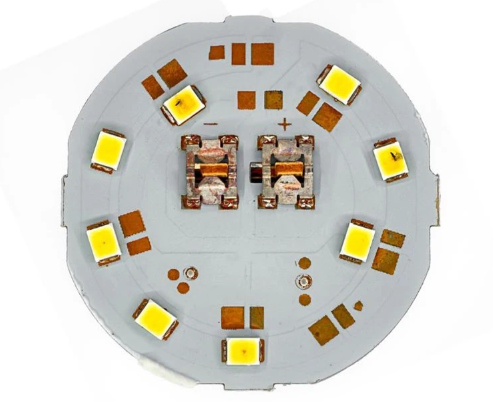Completed CEM-1 single-sided PCB project with LED circuit.