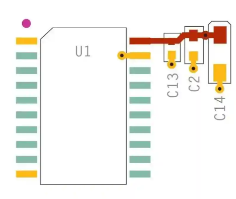 PCB layout showing capacitor placement near IC power pins for effective decoupling.