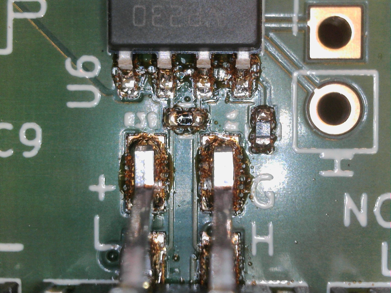 PCB with flux residue before rinsing.