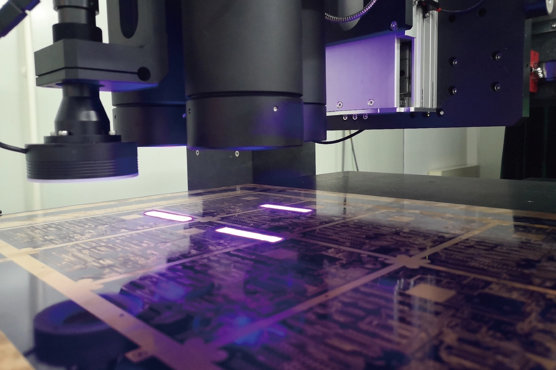 Laser Direct Imaging machine in action during PCB production process.