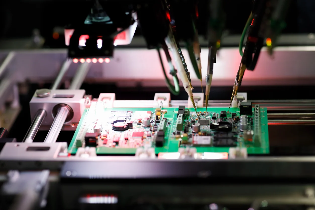 Flying probe testing on a complex PCB for small batch production.