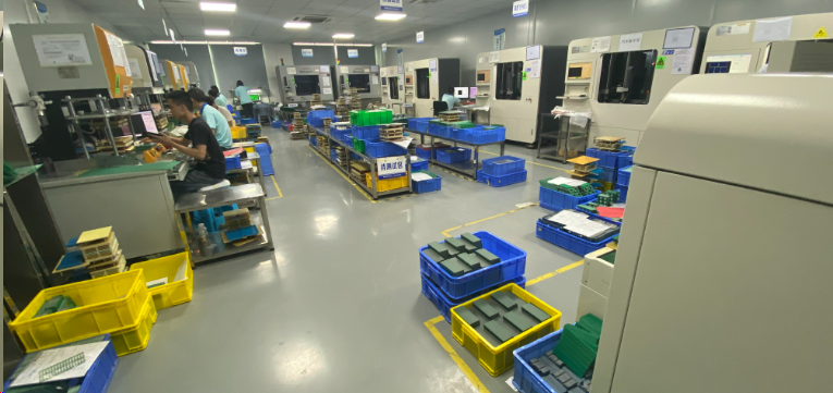 PCB testing equipment on a mass production line ensuring reliability.