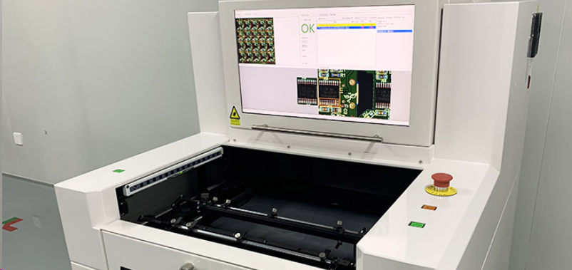 Automated Optical Inspection (AOI) machine scanning a PCB for defects.