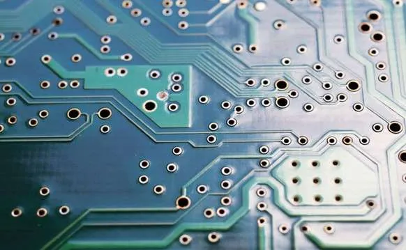 Comparison of a reliable via and a defective via with cracks in a PCB.
