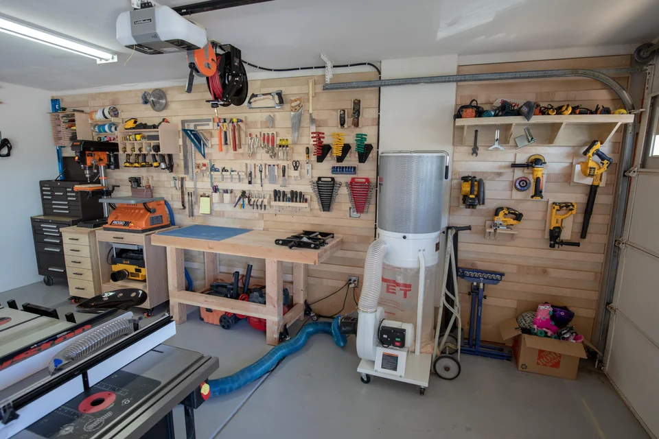 Organized workbench with essential tools for manual electronics assembly.