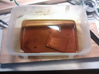 Ferric chloride etching setup for homemade PCB fabrication.