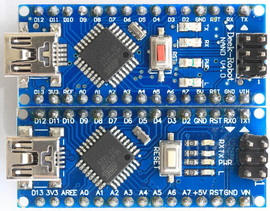 Finished PCB with blue solder mask integrated into an electronic device.