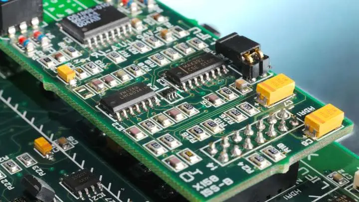 Finished SMT-assembled PCB with perfect solder mask application for reliability.
