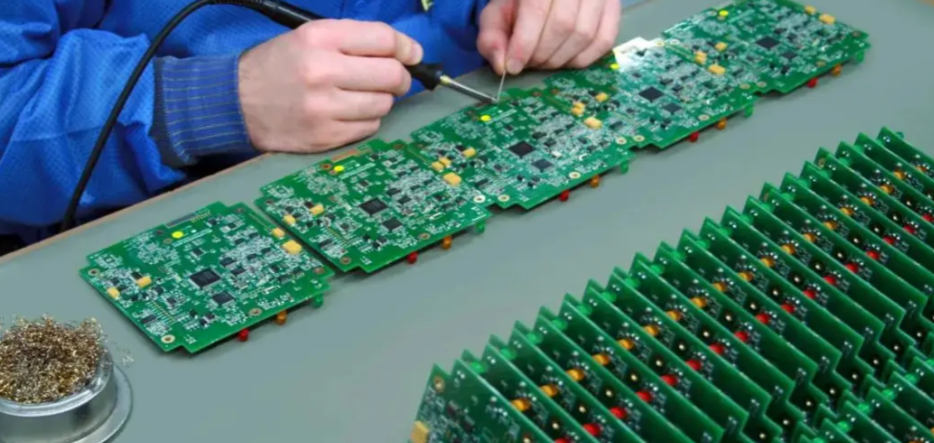 Manual through-hole assembly with hand soldering