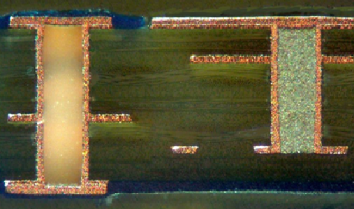 Copper-filled conductive via in PCB for enhanced electrical and thermal performance.