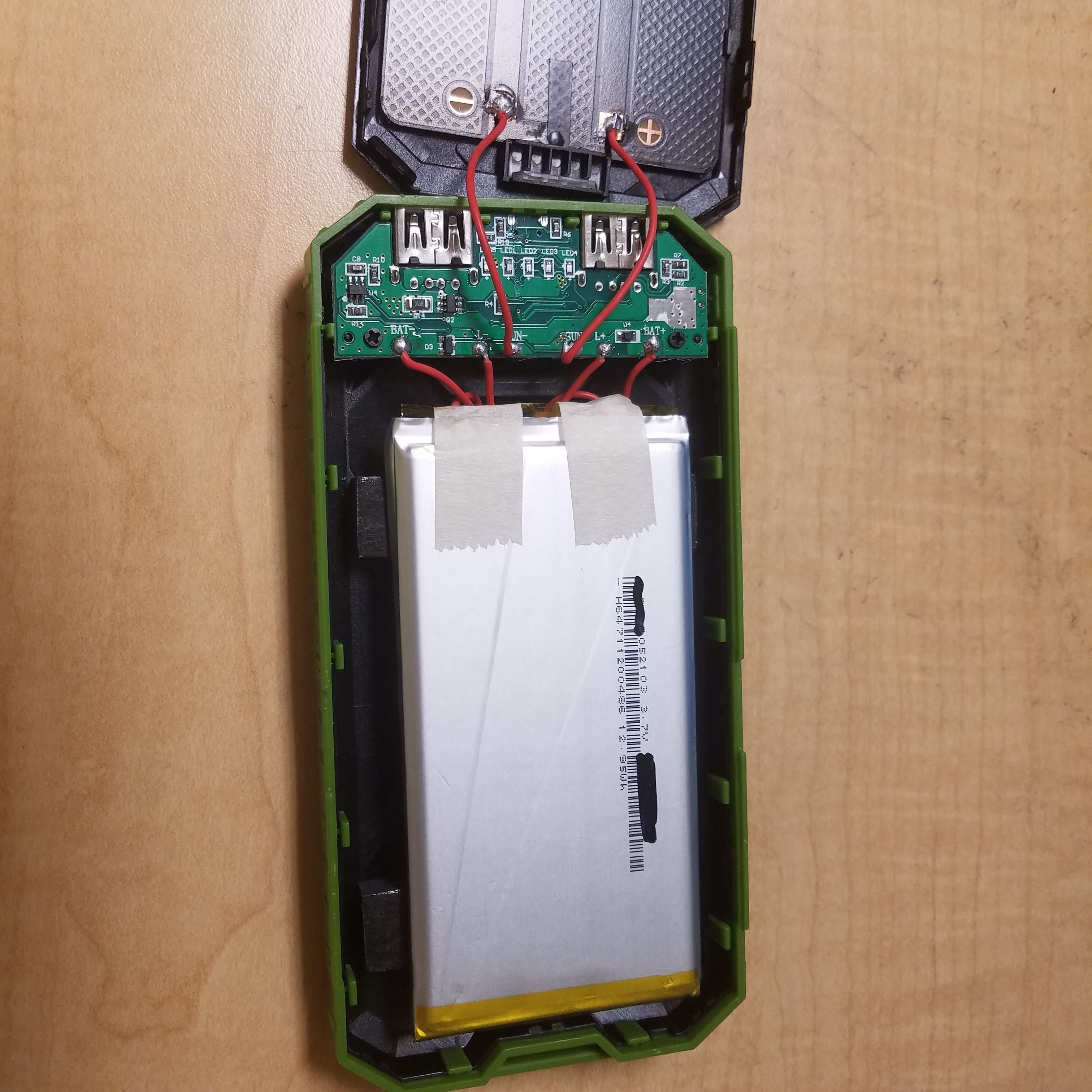 Single-sided PCB in a USB charger or power supply unit.