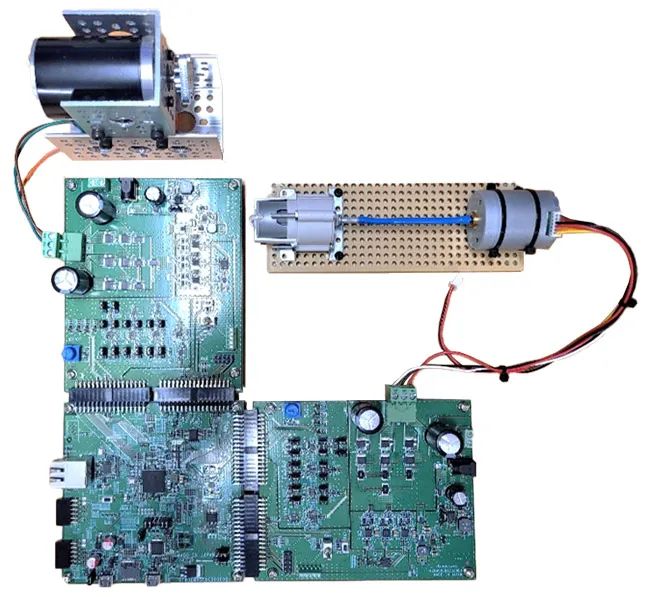 Figure 1. MCK-RA8T1 with two inverter boards for controlling two separate motor assemblies