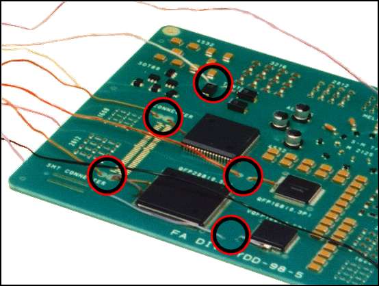 Thermocouple placement on PCB for thermal profiling.