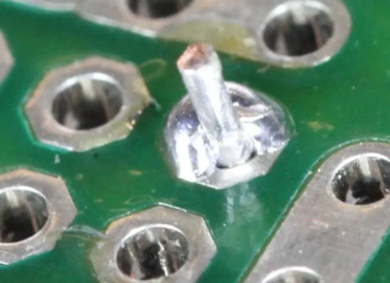 PCB joint showing insufficient solder defect.