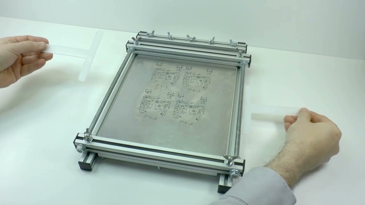 Technician optimizing stencil printer for lead-free PCB assembly.