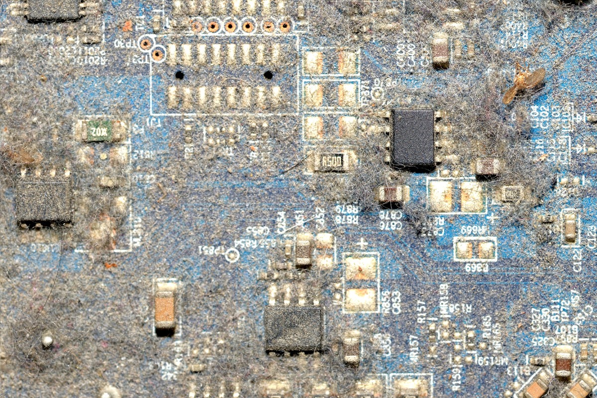 Construction machinery PCB exposed to heat and dust in harsh environment.