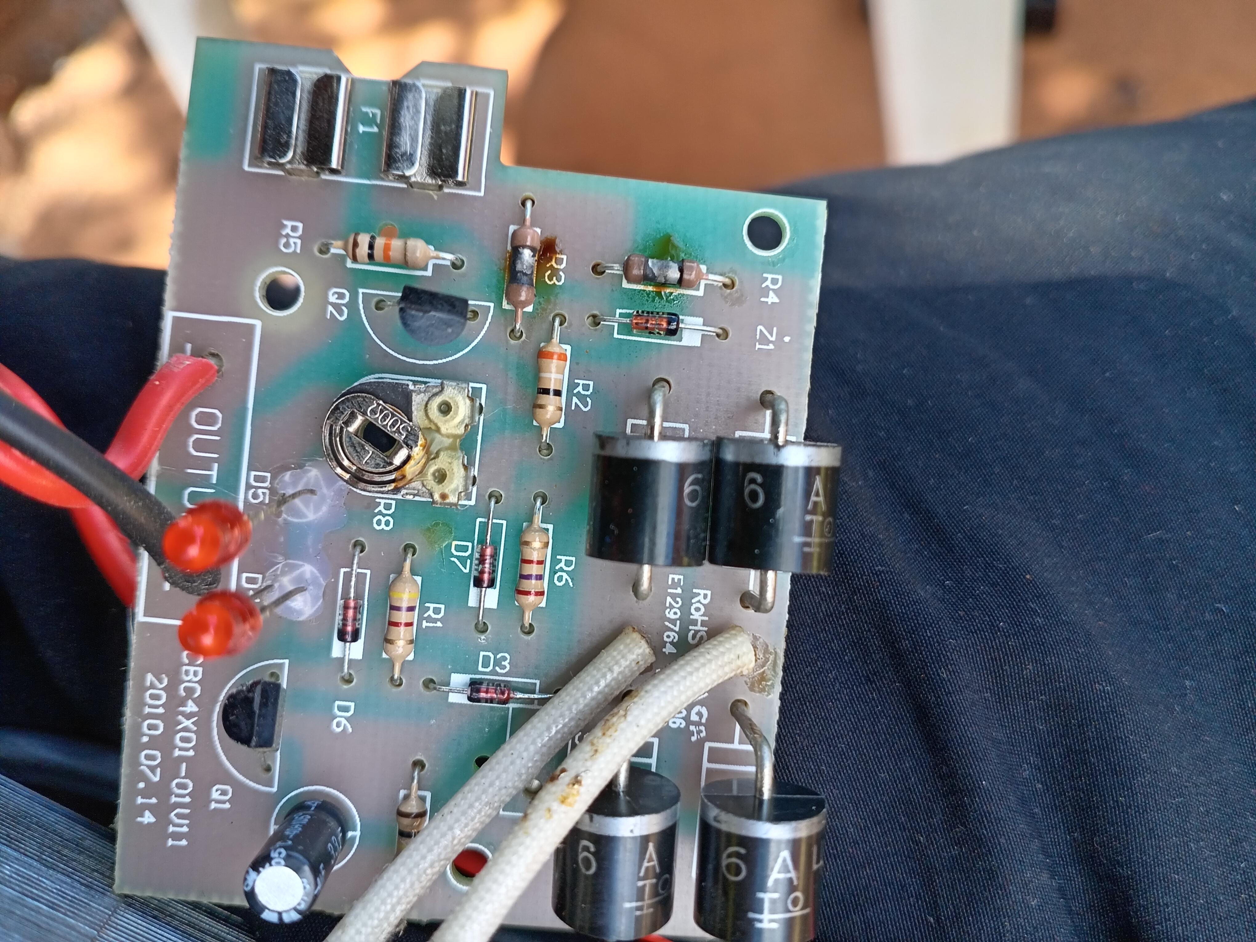 Close-up of resistors on a battery charger PCB