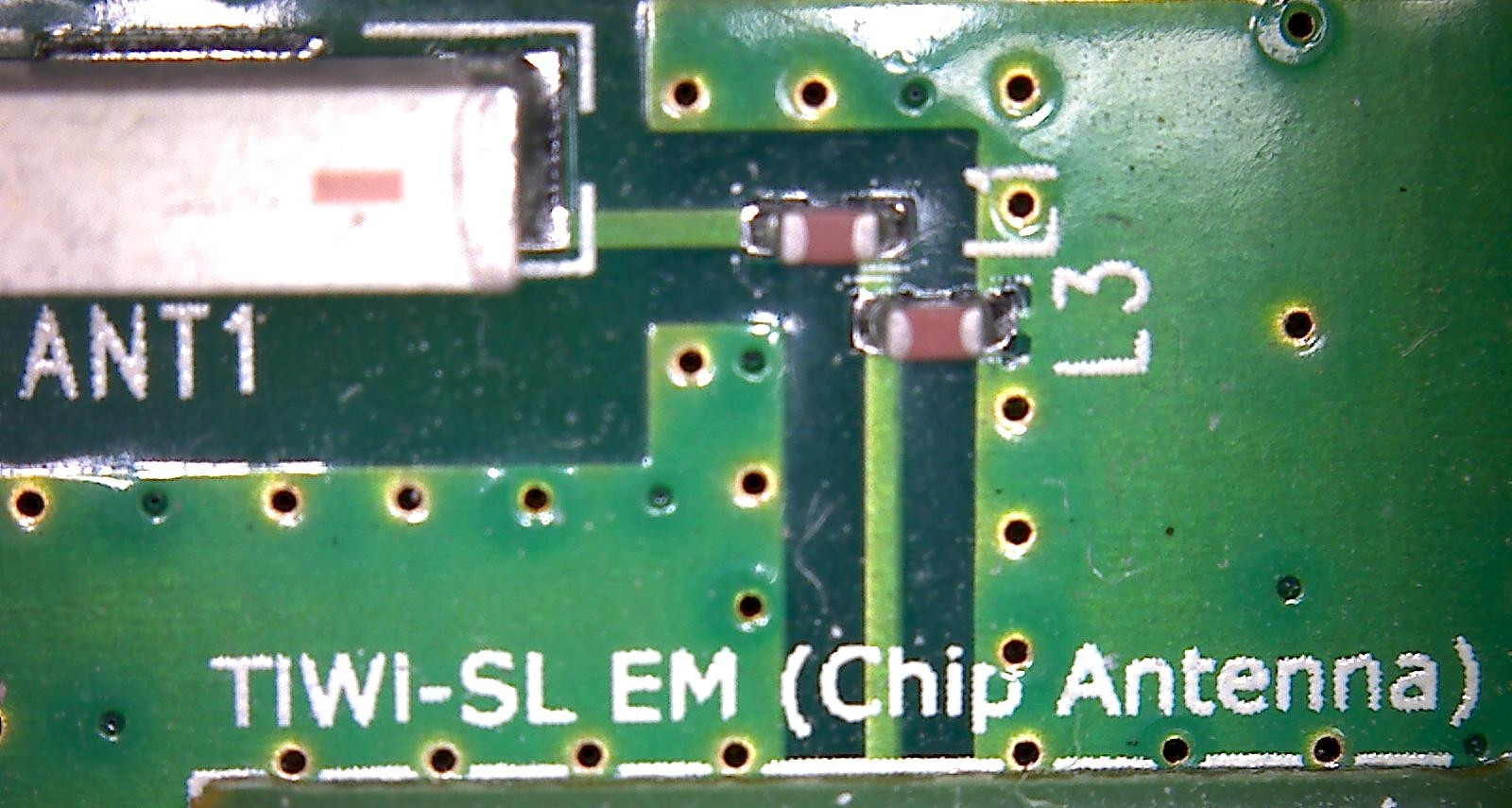 Cross-section of mixed-signal PCB showing through-hole vias for noise reduction.