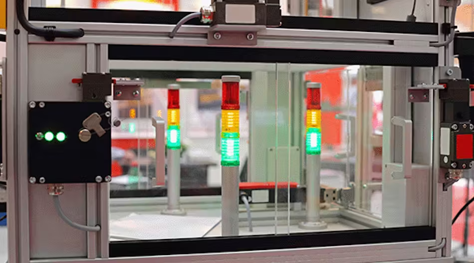 Industrial stack light with red, yellow, and green indicators for automation status