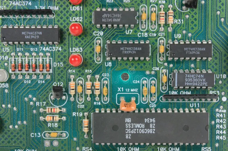 Through-Hole LED with leads on a PCB for indicator light use.