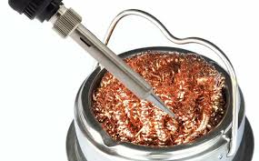 Cleaning a soldering iron tip for better SMT soldering results.