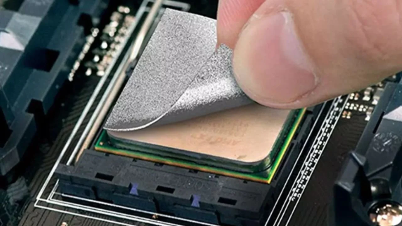 Thermal pad placed on a CPU for heat dissipation.