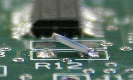 Tombstoning defect on PCB due to warpage.