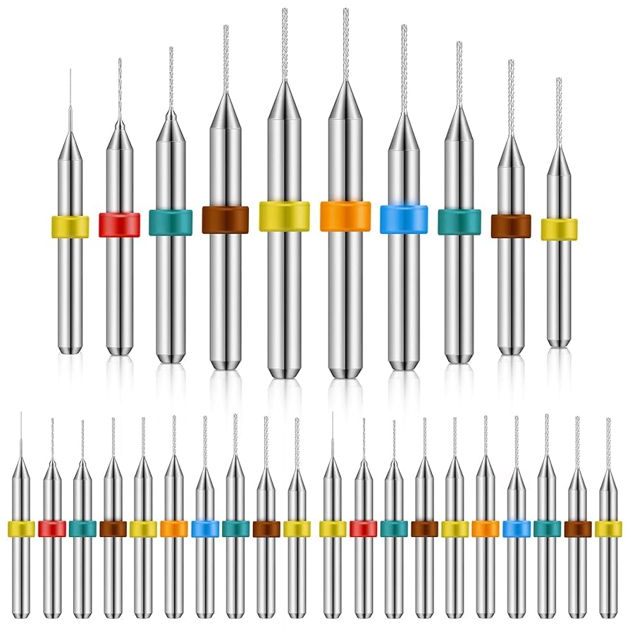Assortment of PCB drill bits for different hole sizes and laminate materials.