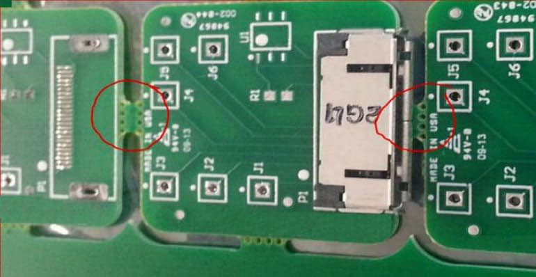 PCB panel with V-scoring and breakaway tabs for stress relief.
