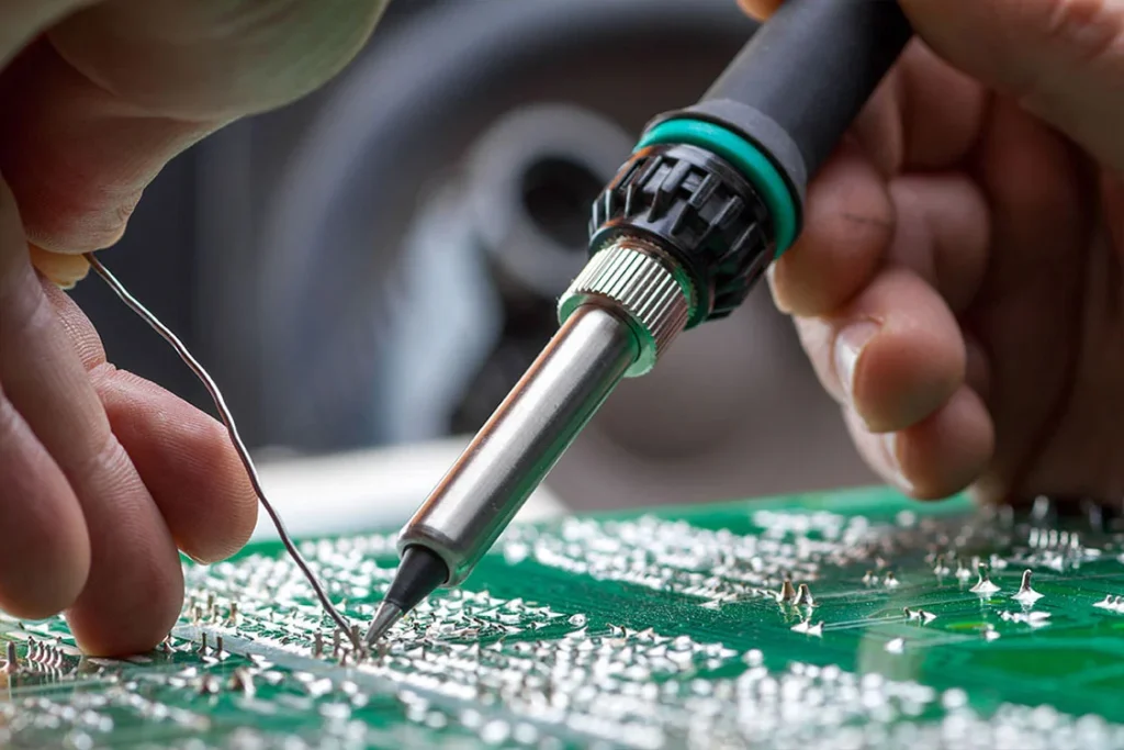 Reworking a circuit board using lead-free solder for strong connections.