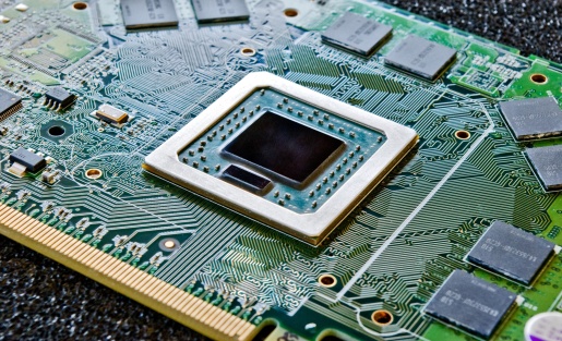 Close-up of PCB with surface finish protecting copper traces.