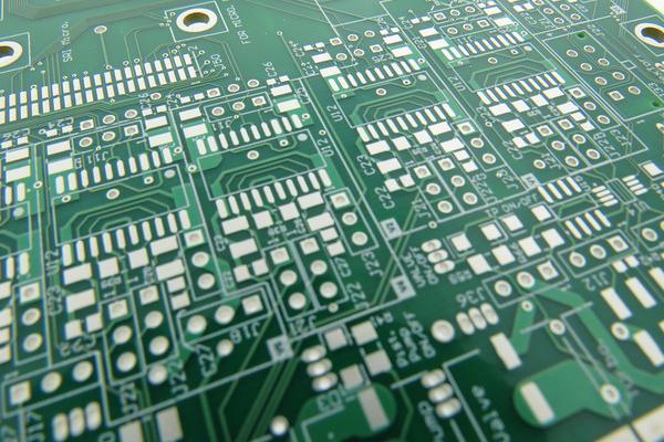 PCB with immersion tin surface finish showcasing smooth, white tin coating.