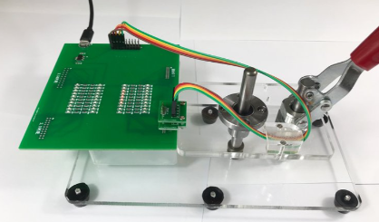 DIY PCB testing setup with low-cost equipment for hobbyists.