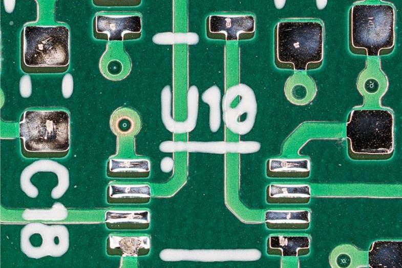 a misaligned multi-layer PCB with offset vias or traces