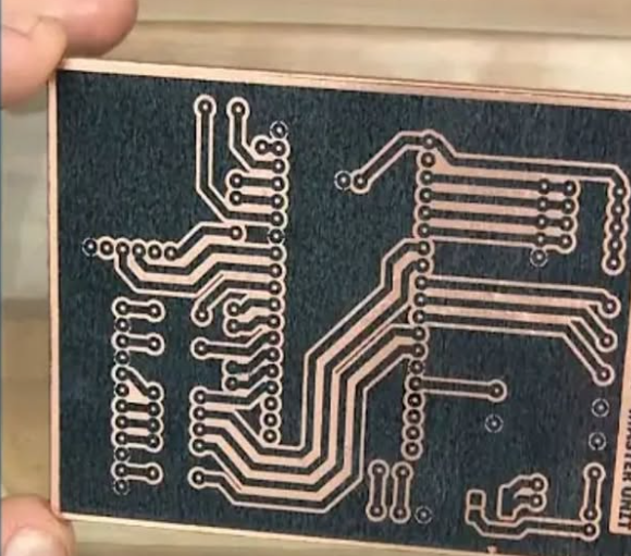 Microscopic view of toner lines on copper clad board before etching