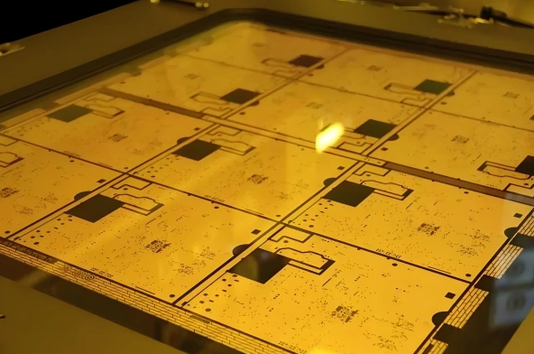 Close-up of chemical etching tank processing high-frequency PCB panels