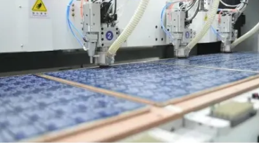 Automated conveyor line processing large PCB batches through soldering and inspection